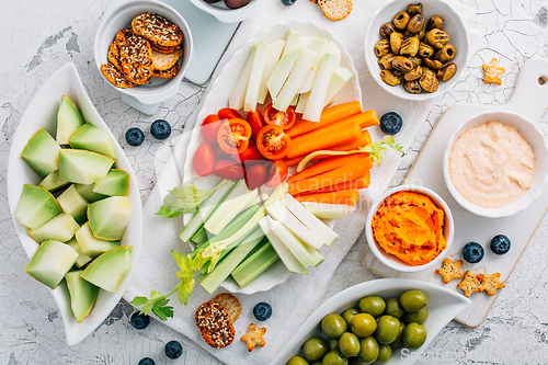 Image of Crudites platter, raw vegetarian food or party vegetarian platter with various veggie snacks and dips