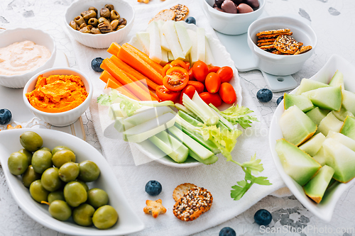 Image of Crudites platter, raw vegetarian food or party vegetarian platter with various veggie snacks and dips
