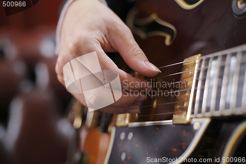 Image of Guitar picking