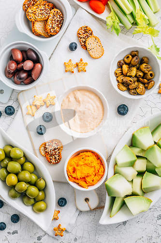 Image of Crudites platter, raw vegetarian food or party vegetarian platter with various veggie snacks and dips