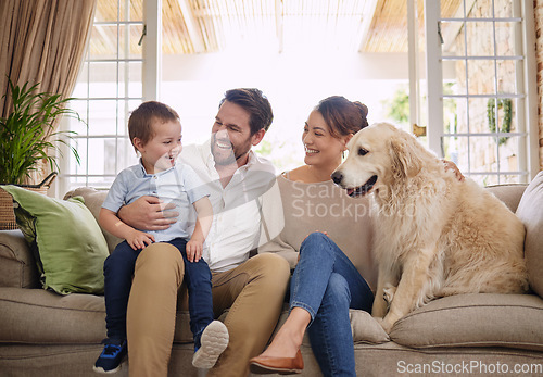 Image of Family laugh, home and dog with child, mom and dad relax on sofa in living room with love. Pet animal, mother and father with young kid for fun, happiness and care in a house with golden retriever