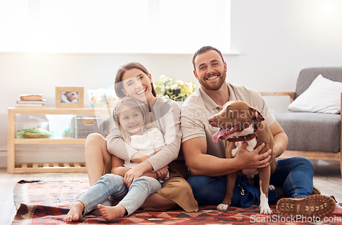 Image of Mom, dad and portrait of kid with dog in living room for quality time, love and care together at home. Mother, father and happy family with child, pet pitbull and relax for happiness on carpet floor