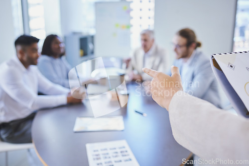 Image of Planning, presenter giving a presentation and business meeting in a boardroom with colleagues at their office. Data review or workshop, teamwork and person with chart discussing with coworkers