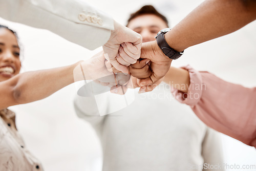 Image of Fist bump, support and group of people for teamwork, challenge and collaboration, team building game or startup goals. Woman in circle with strong, cooperation and integration hands sign for power