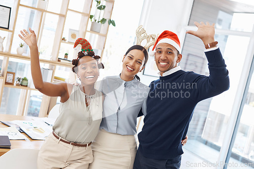 Image of Portrait, staff and business people with celebration, Christmas party and fun with happiness, joy and cheerful. Face, group and coworkers with Xmas hats, office and festive season with holiday event