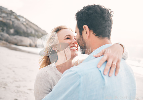 Image of Love, happy and couple hug at beach for holiday, vacation and weekend getaway for anniversary. Travel, marriage and happy mature man hugging woman for bonding, quality time and happiness by ocean