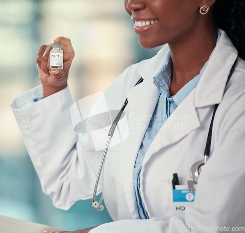 Image of Covid, doctor hands and black woman with vaccine vial for virus or corona. Bottle, medical professional and person with vaccination, medicine or pharmaceutical drugs for happy healthcare at hospital.