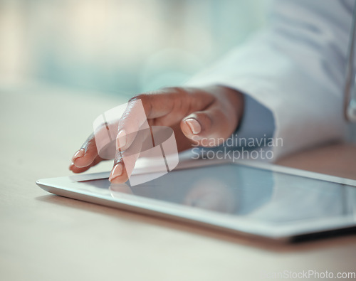 Image of Hand, tablet and research with a doctor in the hospital, typing healthcare data for diagnosis in an office. Technology, insurance and report with a medicine professional searching medical information