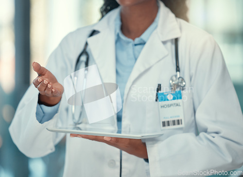 Image of Closeup, doctor and black woman with a digital tablet, telehealth and connection in a hospital, network and research. Female person, medical professional or employee with technology, app and analysis