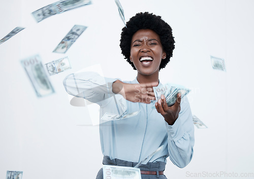 Image of Rich, throwing money and woman with cash win in studio for investment, savings or wealth. Excited black person with bank notes in air for competition award, financial freedom or lottery bonus prize