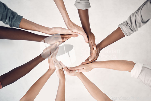 Image of Teamwork, business people together in hand circle for strategy and planning with collaboration at start up. Connection, team and coworking, hands of employees working with cooperation and diversity.