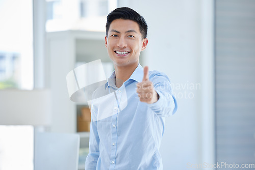 Image of Thumbs up, portrait and happy business man in office with winning, sign or thank you gesture. Face, smile and asian male entrepreneur with hand emoji or vote for yes, like and satisfaction or approve