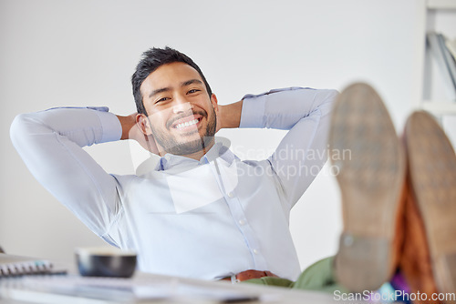 Image of Relax, smile and portrait of business man at desk for pride, stretching and break. Happy, achievement and inspiration with male employee in office for mental health, professional and satisfaction