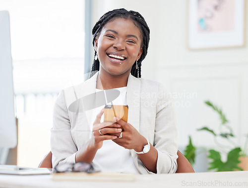 Image of Business, black woman and laughing portrait with a phone at a desk for communication, chat or social media. Happy african female entrepreneur smile for smartphone app or meme with network connection