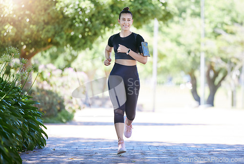 Image of Phone, fitness or happy woman running in park training, cardio exercise or full body workout for marathon. Wellness, athlete runner smiling or healthy sports girl exercising on jog outdoors in nature