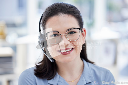 Image of Consultant, portrait of woman call center agent and with headset at her workplace office with smile. Customer service or telemarketing, support or online communication and female person for crm