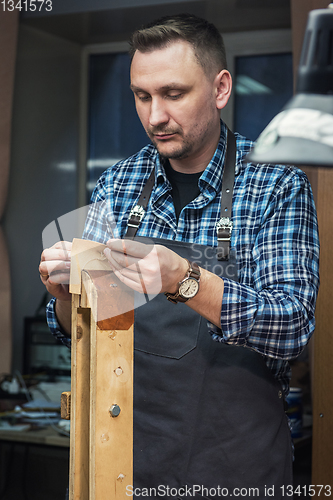 Image of Concept of handmade craft production of leather goods.