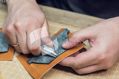 Image of Concept of handmade craft production of leather goods.
