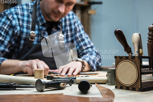 Image of Concept of handmade craft production of leather goods.