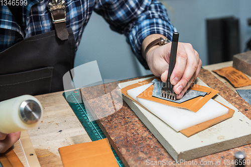 Image of Concept of handmade craft production of leather goods.