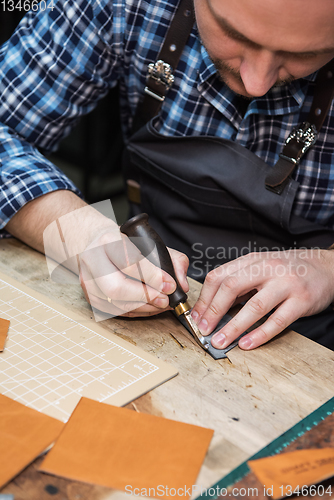 Image of Concept of handmade craft production of leather goods.