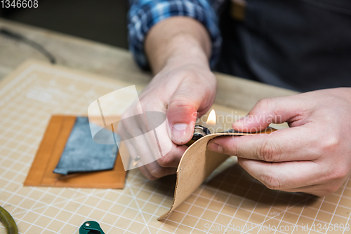 Image of Concept of handmade craft production of leather goods.