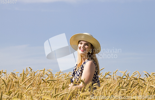 Image of young girl in a wheat field