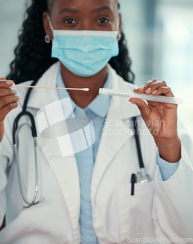 Image of Healthcare, woman doctor with face mask and sterile swab stick at a hospital, Medical checkup, corona test and African female nurse with facial protection for covid or health wellness at a clinic
