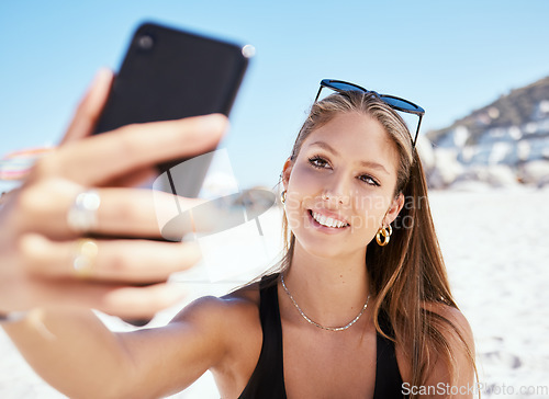 Image of Young woman, beach selfie and smile with beauty, outdoor and summer vacation in sunshine for blog. Girl, happy influencer and photography for travel, social media and sea holiday in Rio de Janeiro