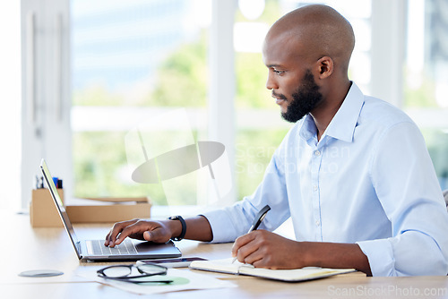 Image of Laptop, accountant and black man writing notes for research, planning and accounting project. Computer, notebook and African male professional auditor working online, email and internet business.