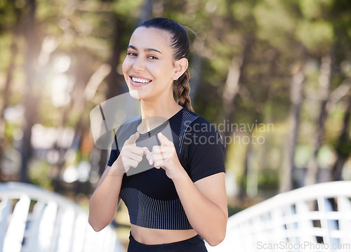 Image of You, portrait of runner or happy woman pointing in park ready for a workout, exercise or fitness training. Face, sports girl or excited athlete with smile, positive mindset or wellness in nature