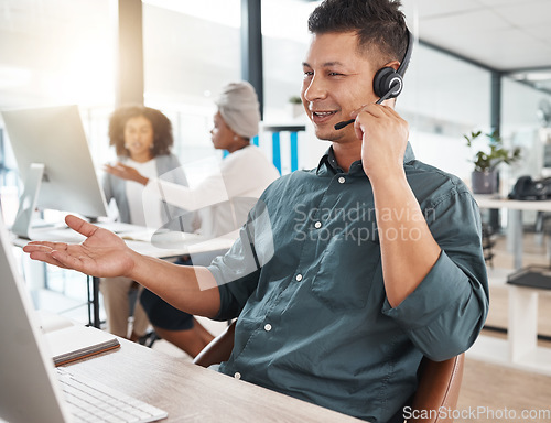 Image of Smile, call center and man listening on computer for telemarketing, customer service and support. Crm, contact us and sales agent, consultant or employee working at help desk, consulting and business