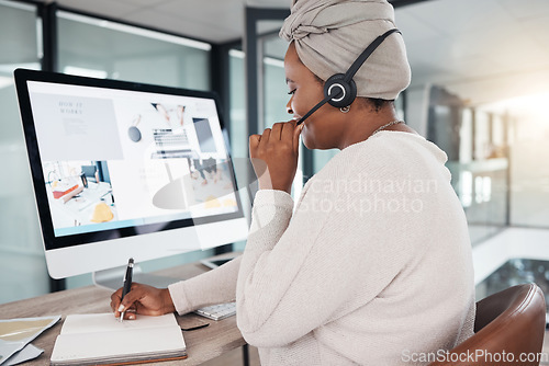 Image of Call center, black woman and writing notes for customer service schedule, support and contact. Notebook, telemarketing and African female sales agent, consultant or employee consulting at help desk