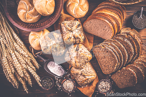 Image of Assortment of different kind of cereal bakery - bread, pasties, buns, with healthy seeds