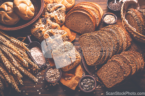 Image of Assortment of different kind of cereal bakery - bread, pasties, buns, with healthy seeds