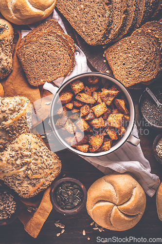 Image of Assortment of different kind of cereal bakery - bread, pasties, buns, with healthy seeds