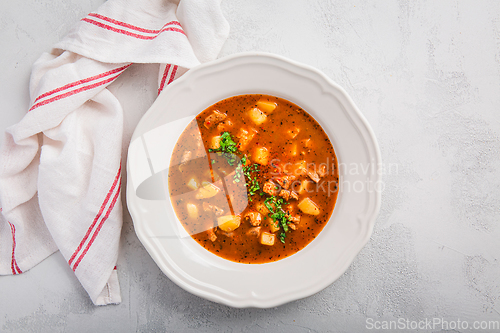 Image of Hungarian hot goulash soup, beef, tomato, pepper, chili, smoked 