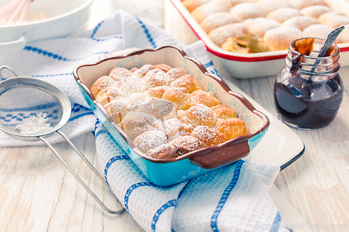 Image of Sweet rolls, Buchteln (buchty) filled with plum jam or jelly wit