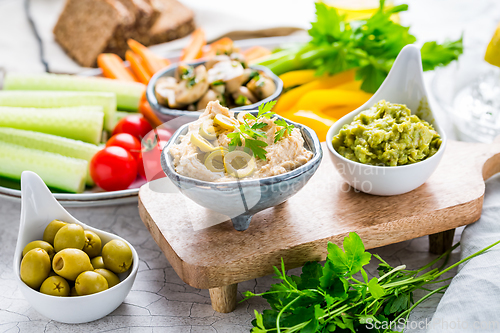 Image of Summer crudites platter with hummus and avocado dip