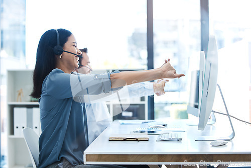 Image of Call center, team and people stretching while consulting for contact us, crm or customer service in office. Telemarketing, stretch and woman with man consultant online for support, help or service