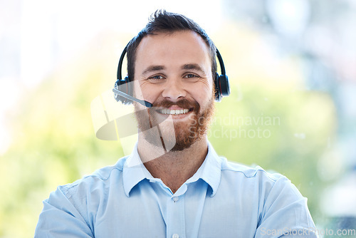 Image of Happy man, call center and portrait smile in customer service, support or telemarketing at office. Friendly male person or consultant agent smiling for virtual assistant or online advice at workplace