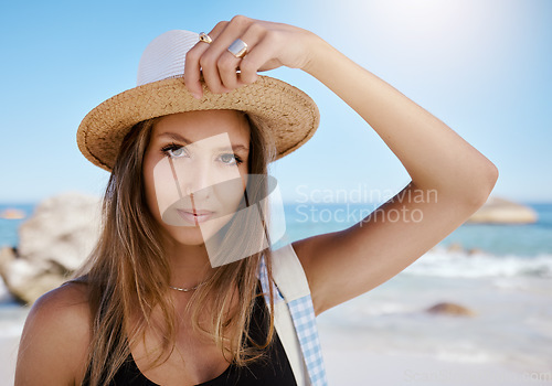 Image of Woman, portrait at beach with travel and summer tropical vacation in Mexico with tourism and adventure. Female person is calm outdoor, relax on holiday with journey and nature, sun and sea waves