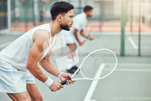Image of Man, tennis and team is ready on a court for game and exercise with wellness in india. Male athlete, together and racket for competition with fitness for a challenge with a workout in the outdoor.