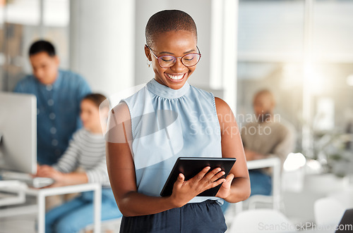 Image of Happy, business tablet and black woman, designer or creative in coworking office. Touchscreen, technology and African female professional on email app, design research or website, internet or reading