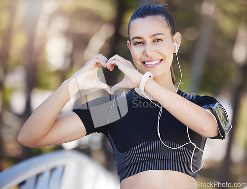 Image of Runner, heart hands or portrait of happy woman in park for running exercise or workout for body health. Love sign, hand gesture or active girl athlete runner in sports training for fitness in nature