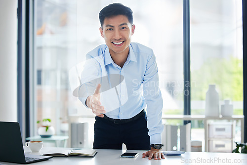 Image of Professional, man and portrait with handshake for deal at company with asian or entrepreneur. Introduction, partnership and business person for interview with collaboration and smile at startup.