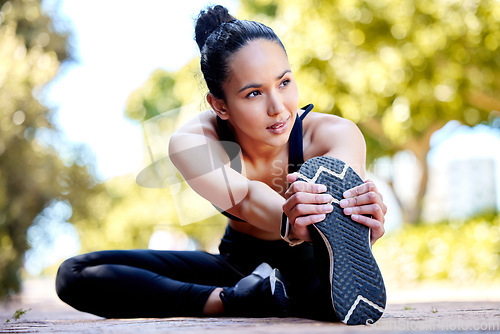 Image of Stretching legs, fitness and woman outdoor for health, exercise and wellness. Sports, leg and female athlete stretch, warm up body or get ready to start workout, training or running, cardio or jog.