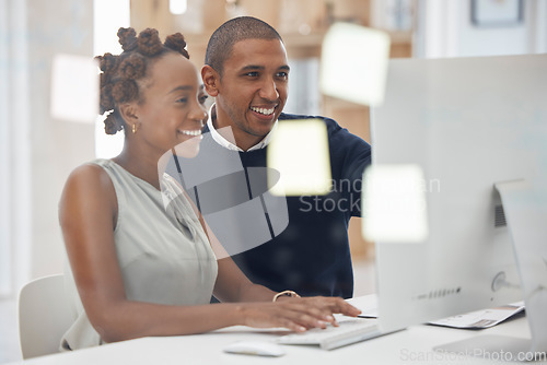 Image of Collaboration, colleagues working together and at computer in their modern workplace office. Teamwork or partnership, support or and mentor with coworker at her pc typing with help at workstation