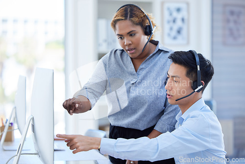 Image of Computer, training and call center with business people in office for help, advice and customer support. Telemarketing, coaching and woman mentor with asian man online for crm, faq and contact us