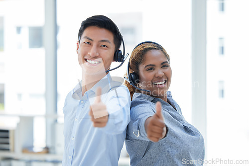 Image of Call center, thumbs up and portrait of business people in office for teamwork, achievement and support. Customer service, target and motivation with Asian man and woman for thank you, emoji or winner